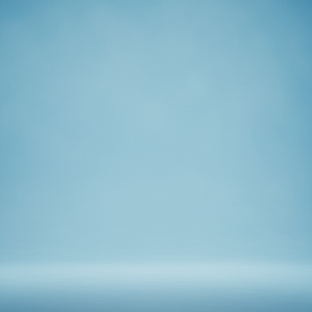 Fons d'estudi buit de color blau clar amb un terra il·luminat suaument.